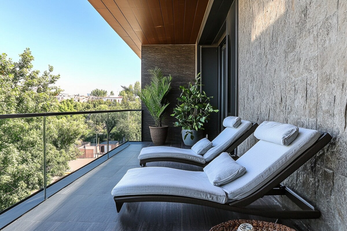 Contemporary Balcony Design with Textured Walls and Lounge Chair