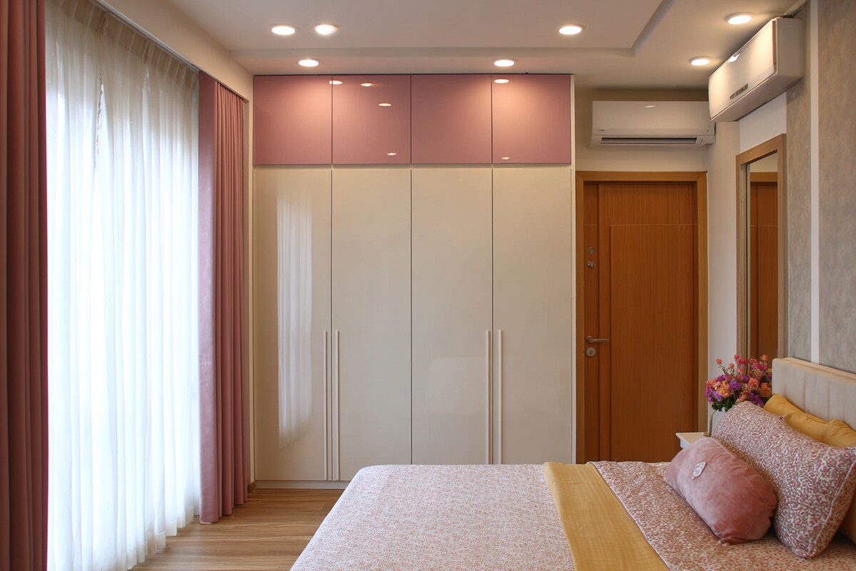 Modern 4 Door Swing Wardrobe Design in Champagne with Rose Pink Loft